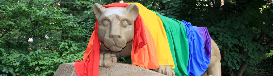 state of nittany lion mascot draped in rainbow flag