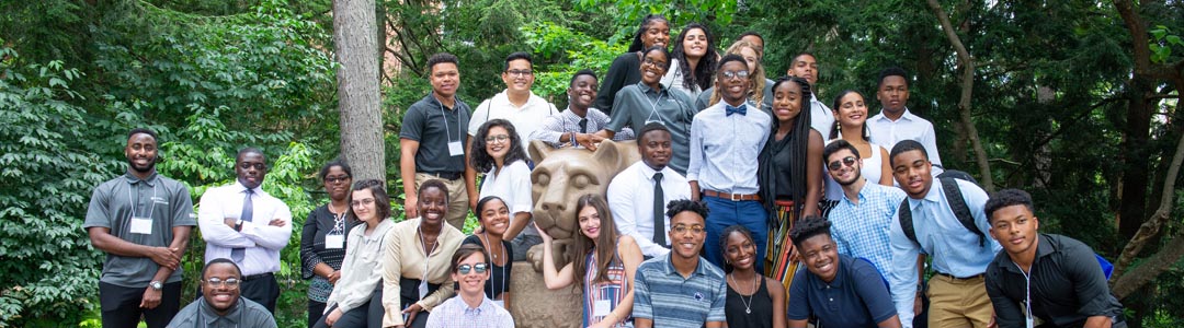large diverse group of students at the Nittany Lion Shrine